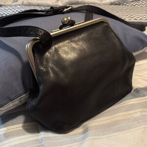 This
Unique Nine West crossbody bag